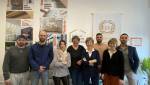 Photo de groupe avec artisan  investisseurs et agents immobiliers