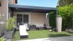 pergola bioclimatique adossée maison