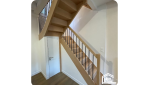 pose d'un escalier tournant en bois 