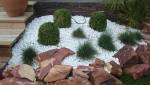 Aménagement de jardin avec revêtement galets en quartz blanc - Nantes 44 