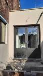 Fabrication sur-mesure d'une porte ouverture à l'anglaise en aluminium