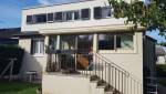Surélévation de maison avec ouvertures en façade