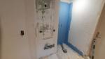 Travaux en Cours de Rénovation de Salle de Bain : Équipe à l’Œuvre