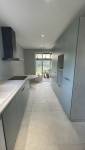 Fin des travaux tranformation chambre en cuisine moderne avec ouvertures sur jardin