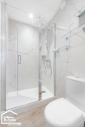 Grande douche à receveur plat