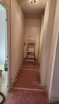 Couloir en cours de rénovation - Dépose du sol 