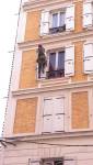 Intervention d'un cordiste sur une façade