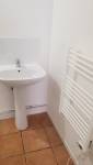Pose d'une lavabo et sèche serviette électrique dans nouvelle salle d'eau appartement RDC (13000)