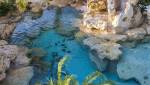 Construction de piscine lagon avec rochers ornementaux - Valence 26
