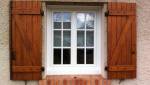 Menuiserie PVC avec volets bois