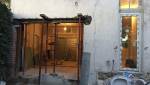 Ouverture d'une baie vitrée pour moderniser une maison ancienne