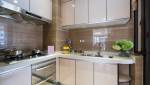 Rénovation de cuisine en appartement avec façades inox sur Osny (95)