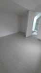 Pose d'un sol PVC dans l'extension