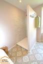 pose de douche dans une salle  de bains 