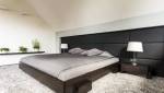 Transformation des combles à Pessac (33600) : Une chambre principale moderne et élégante