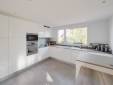 Rénovation de cuisine avec mobilier blanc effet laqué - Pornic 44210