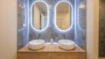 Éclairage LED moderne pour des miroirs ovales
