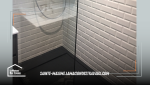 une salle de bain moderne avec des solutions de rangement efficaces et une douche à l'italienne facile à entretenir.
