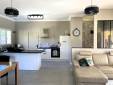 Neuville (69250) : rénovation intérieure avec création d'un sas d'entrée et nouvelle décoration du séjour et de la cuisine