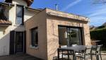 Vue extérieure de la maison après l'extension