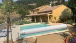 Piscine avec volets roulants La Maison Des Travaux Ales