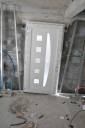 Nouvelle porte d'entrée aluminium sur une extension de maison - Combs-la-Ville 77380