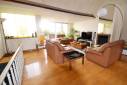 Pose de parquet en chêne massif dans un salon de maison - Cholet 49300