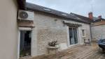 Façade rénovée en pierre apparente