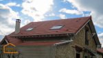 Toiture rénové en tuile plat