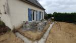 Préparation des fondations pour l'installation de véranda : préparation du sol pour l'extension maison (Vue 2)