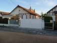 Installation de portail battant PVC et construction de clôture maçonnée en cours - Coubert 77170