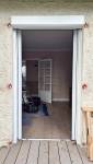 Baie vitrée extérieure après rénovation - Maison lumineuse