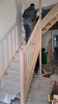 Pose de la rambarde de l'escalier