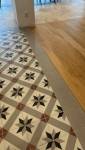 Détail parquet et carreaux ciment
