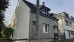 Maison terminée avec ITE et bardage bois pour une rénovation énergétique réussie