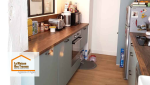 Aménagement intérieur à Agen : Cuisine équipée rénovée avec rangements sur mesure, plan de travail chaleureux et électroménager intégré. Une réalisation à Agen.