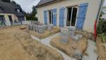 Préparation des fondations pour l'installation de véranda : préparation du sol pour l'extension maison (Vue 1)