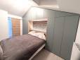 chantier terminé : magnifique tête de lit dressing dans cette suite parentale