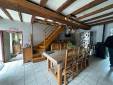  Ancienne pièce de vie avant travaux de rénovation intérieure dans une maison - Cholet 49300