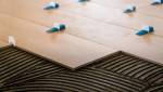 Pose parquet collé