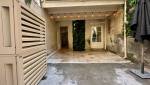 Cour intérieure rénovée terrasse travertin La Maison Des Travaux Nîmes