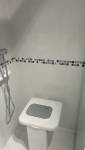 siège rétractable de salle de bain PMR