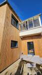 ITE entrée avec façade en bois