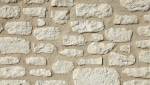 Mur en pierre rénové