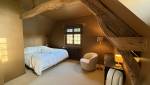 La chambre parentale avec ses poutres