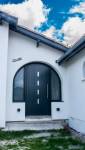 Changement d'ouverture pour porte sur mesure en façade