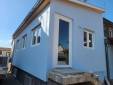 extension d'une maison avec la porte d'entrée