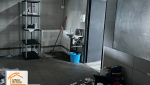 La Maison des Travaux Albertville, création buanderie sur-mesure, cloisonnement intérieur, rénovation salle de bain cachée, aménagement local professionnel