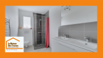 Salle de bain rénovée à Aix-en-Provence : douche italienne, double vasque et carrelage contemporain avec Laurent Nemer.