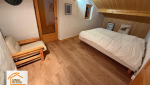 rénovation avec courtier en travaux, alternative à la moquette, pose sol PVC Savoie, transformation rapide sol, maison moderne Albertville